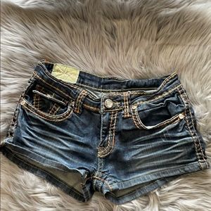 Denim shorts with rhinestone buttons